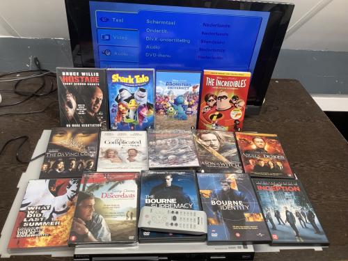 DVD speler van Philips type DVP3142 met afstandsbediening. Met stapel dvd’s