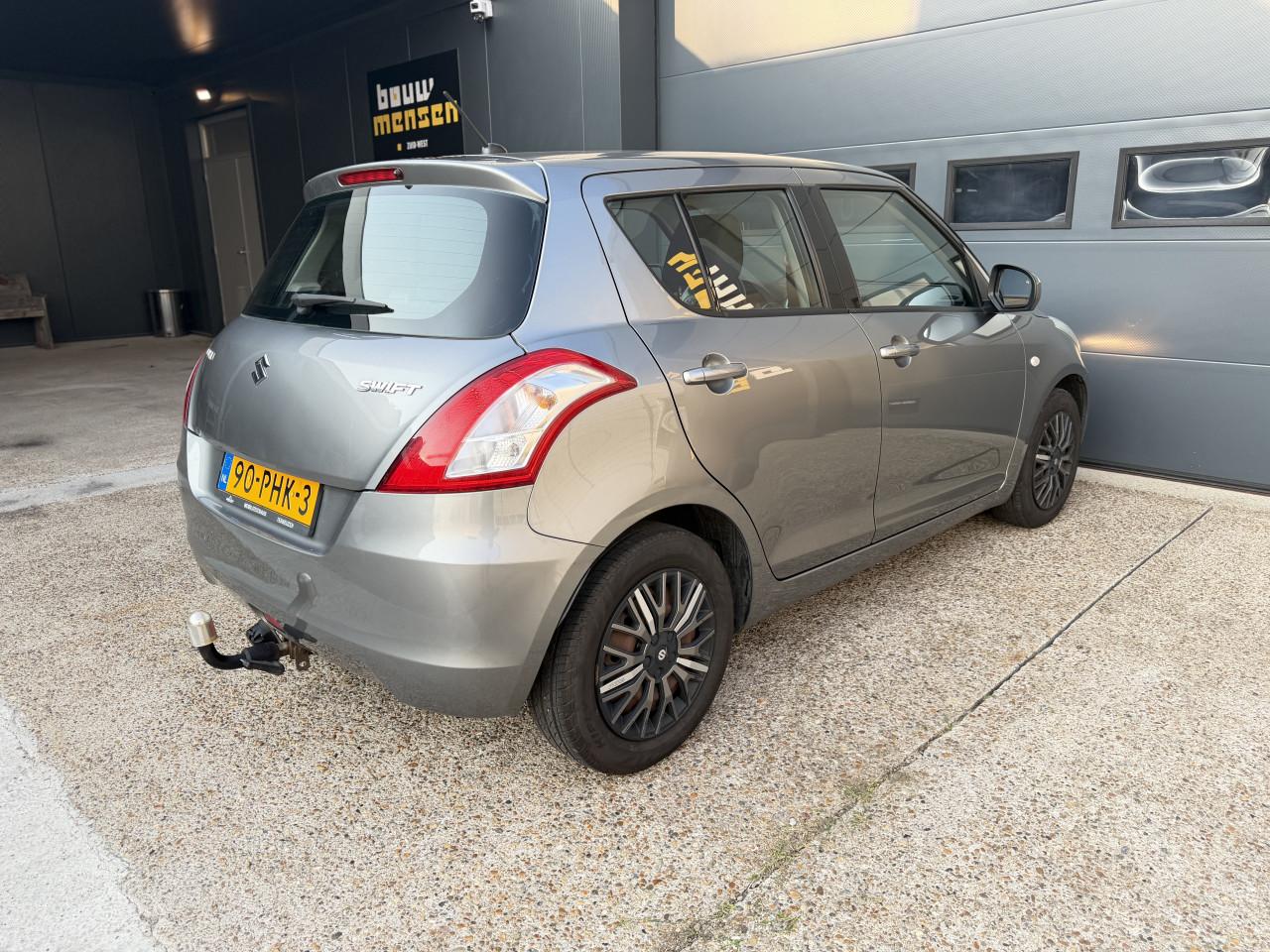Suzuki Swift 1.2 Comfort EASSS 2011 5Drs Grijs Airco Apk Nap Navi