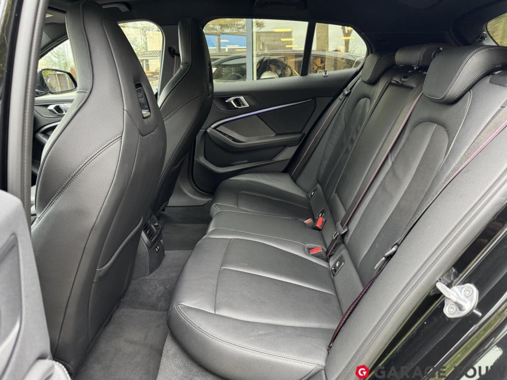 BMW 1 Serie m135i xdrive high executive edition pano orig.nl