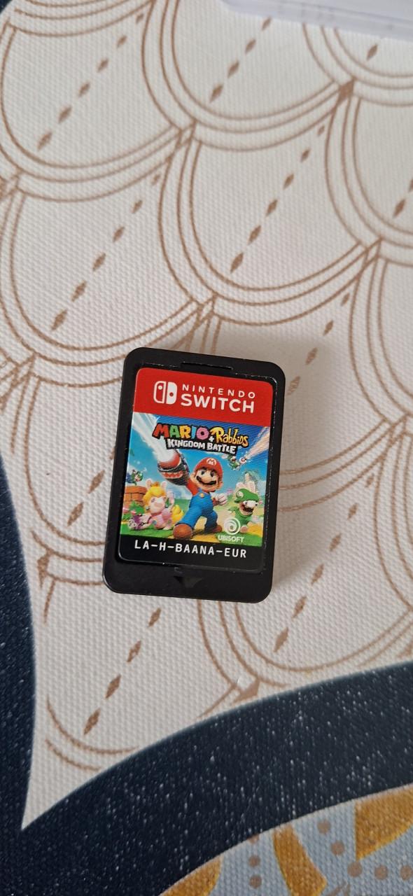 Nintendo Switch Oled wit + hoes en 4 spellen