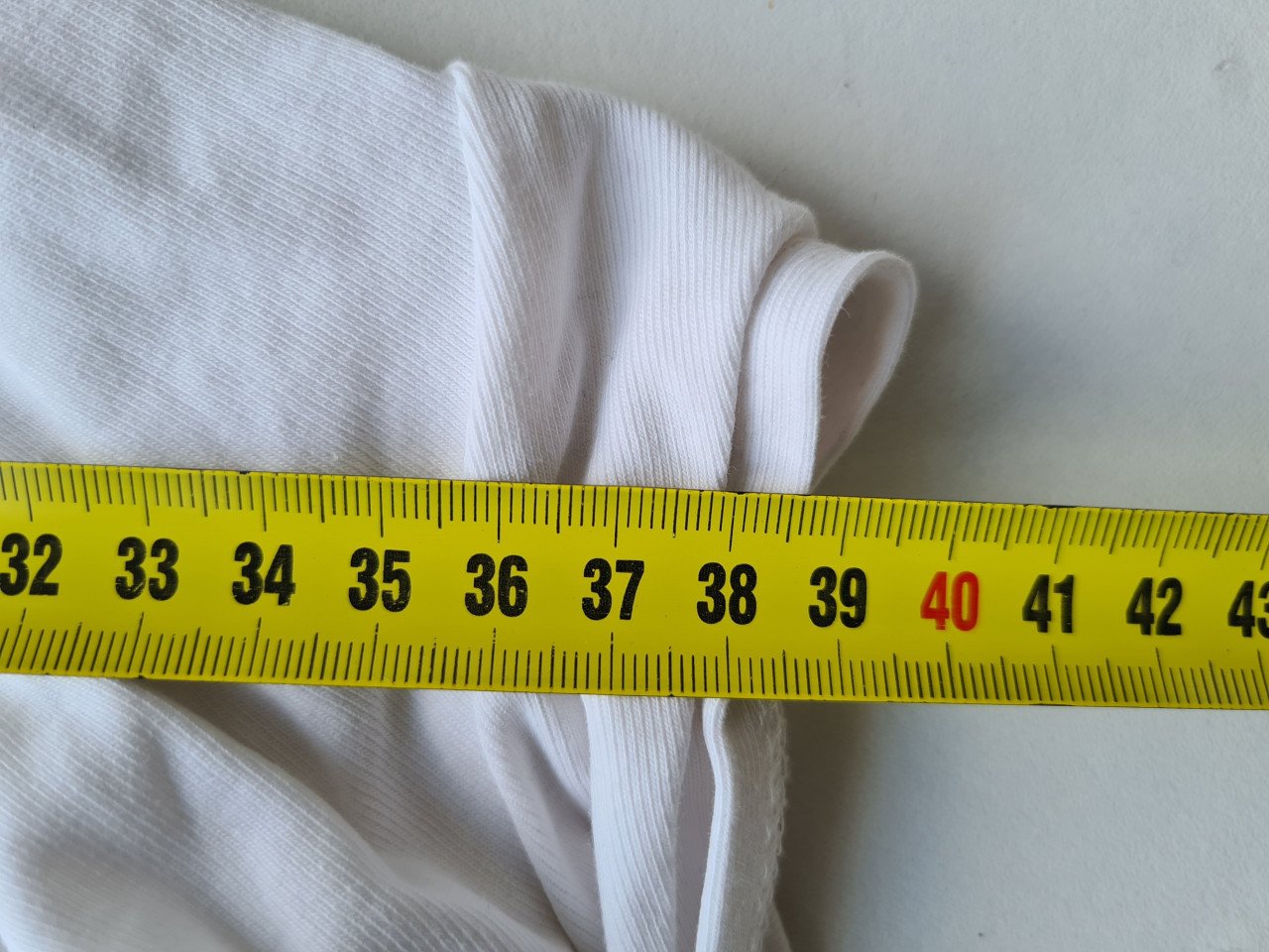 Wit shirt met knoop detail Mt 128-134