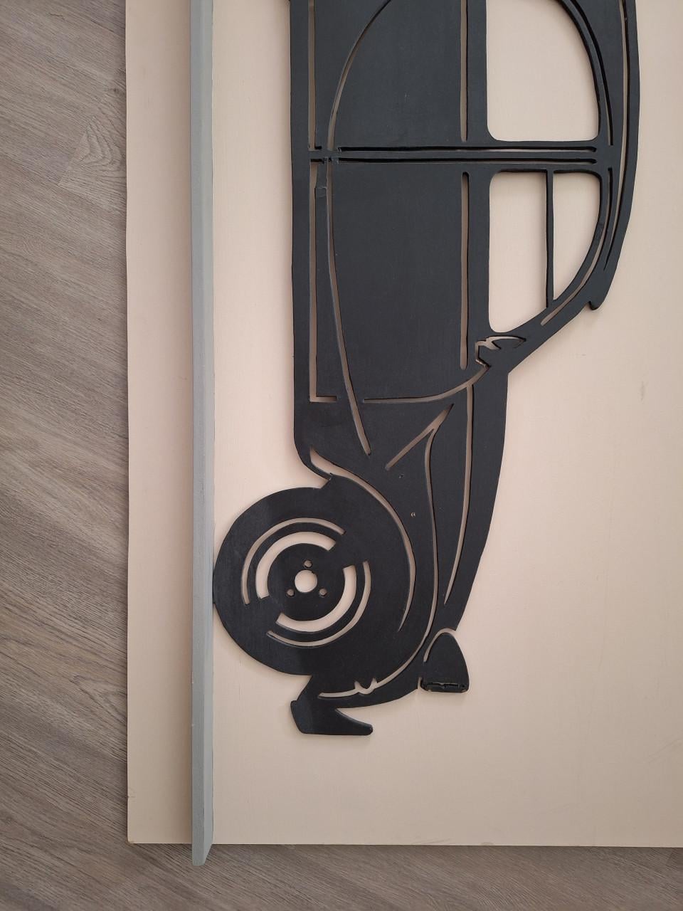 Citroën 2CV aan de wand
