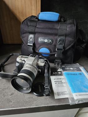 Leuke werkende Minolta Dynax 4 35 mm spiegelreflexcamera..