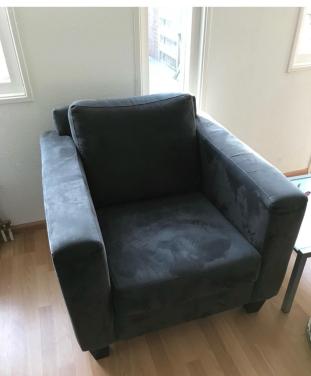 Grijze fauteuil