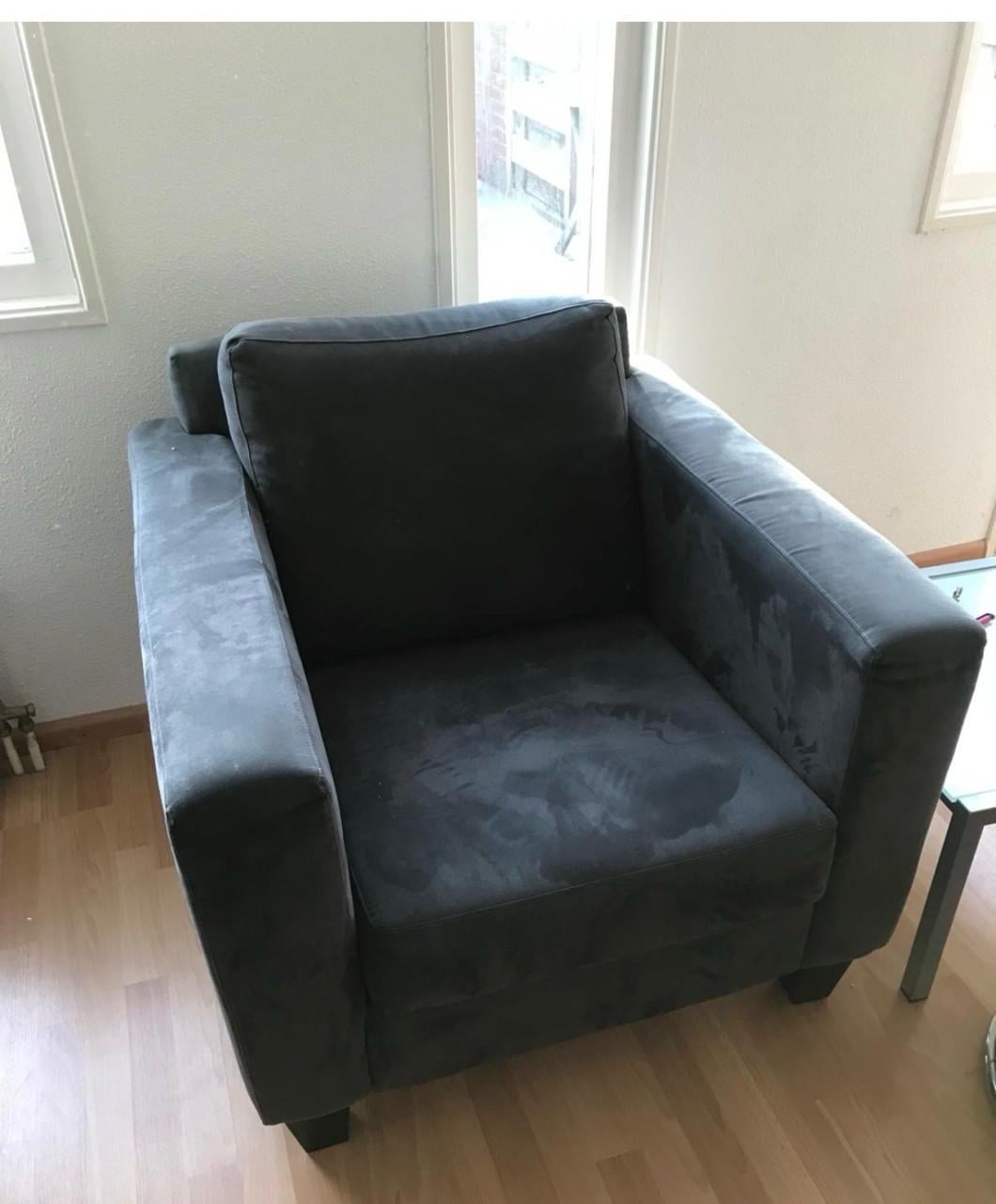 Grijze fauteuil