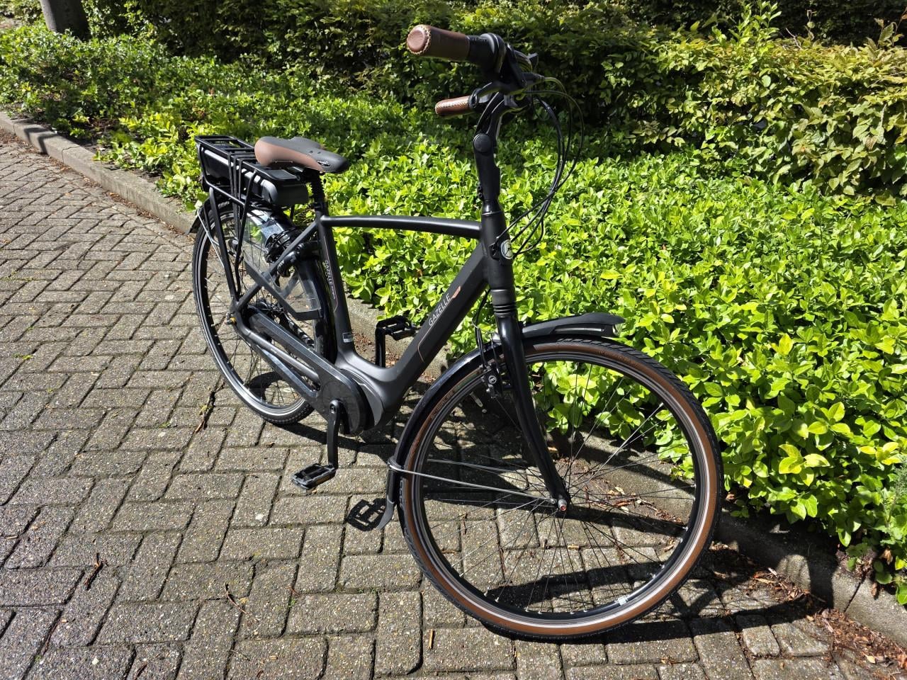 Gazelle Orange elektrische heren fiets met Bosch middenmotor en 500wh accu