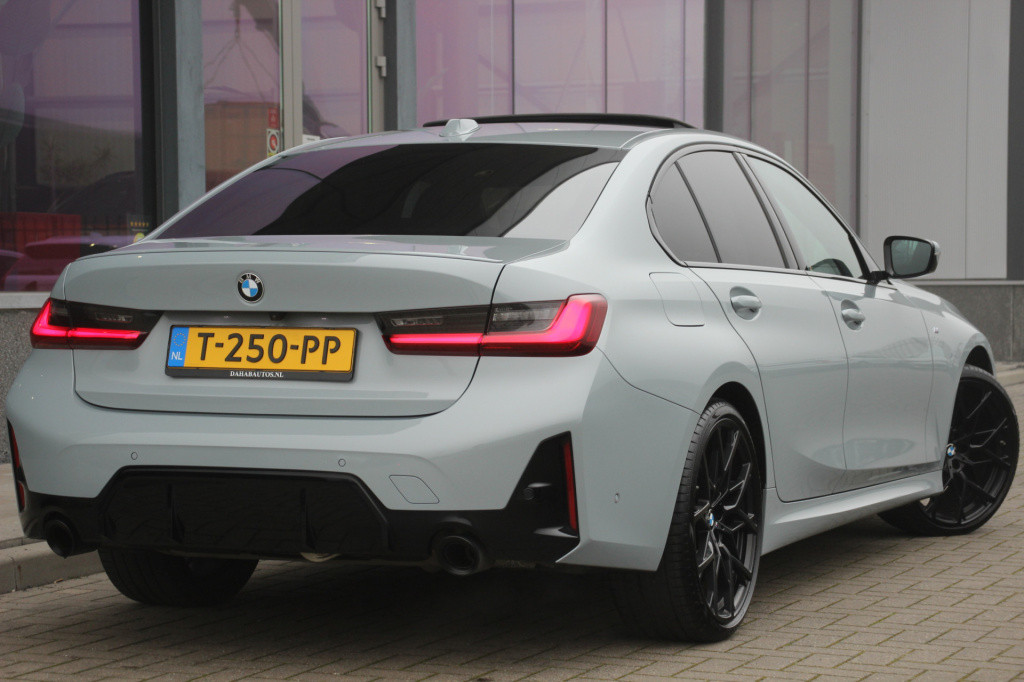 BMW 3-serie 320i m-sport | schuifdak | 20'' styling 795m | el trekhaak