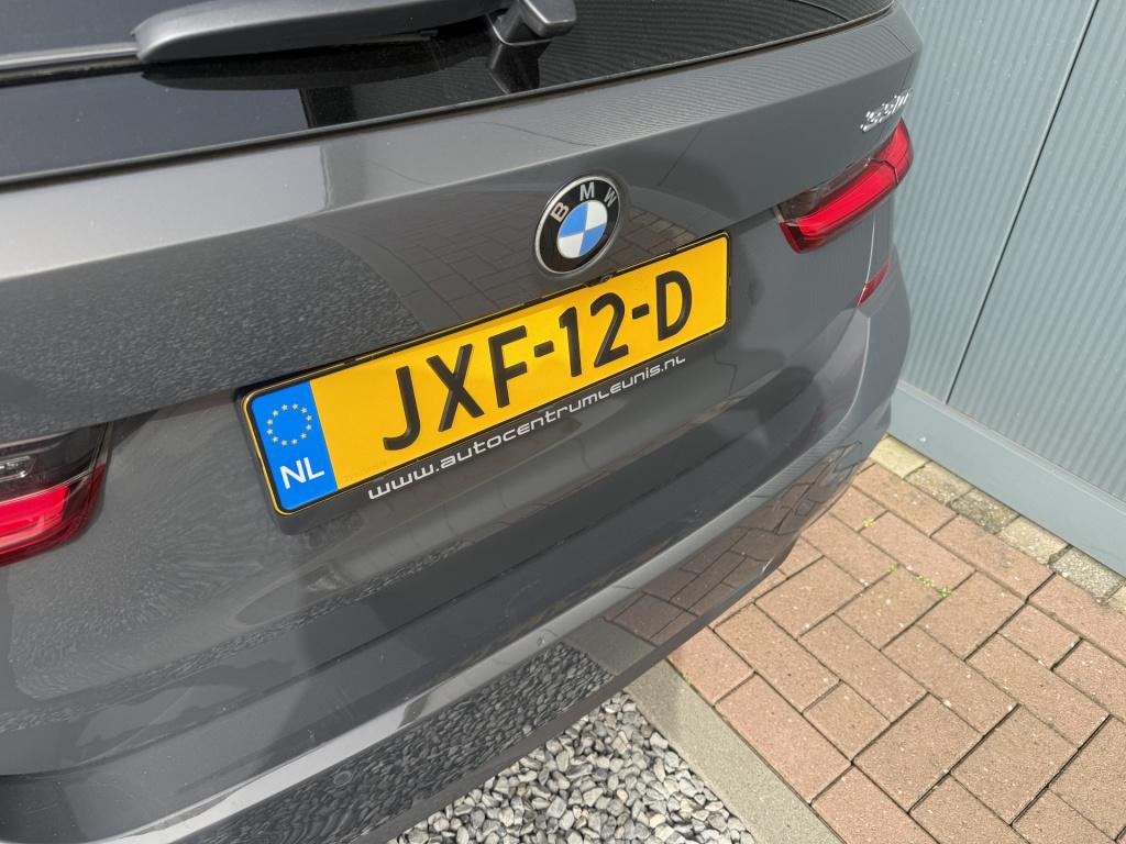 BMW 3-serie touring 330e automaat high executive m-sportpakket