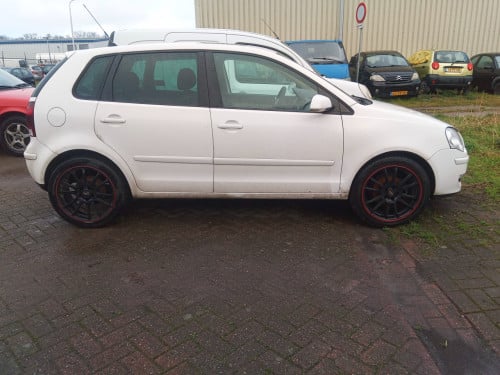 VW Polo 1.4 benzine met elektrisch schuifkanteldak,ramen +airco te koop