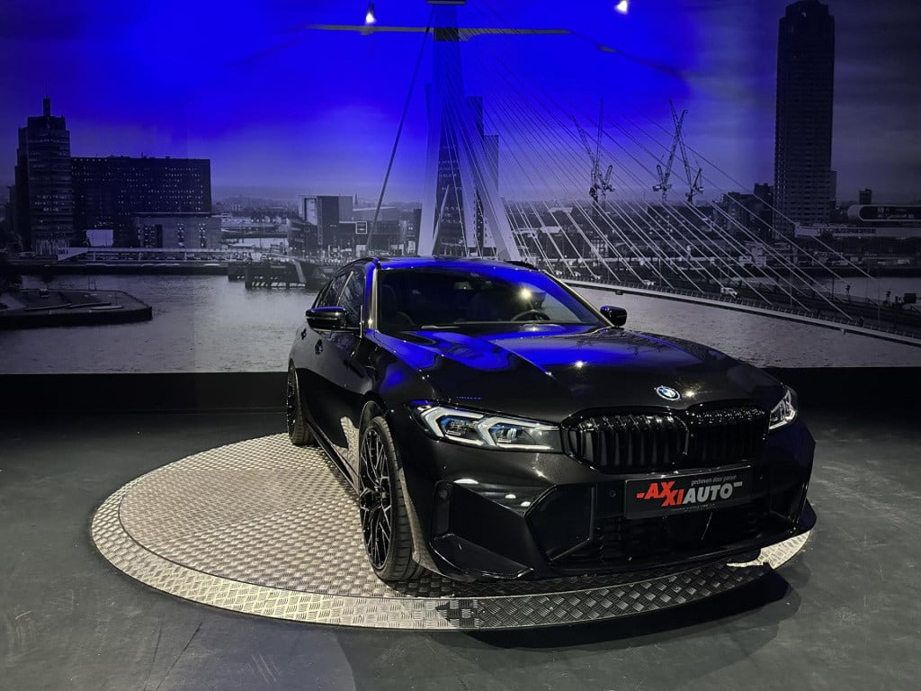 BMW 3-serie touring 330e xdrive *pano*360camera*sportstoelen*laser*