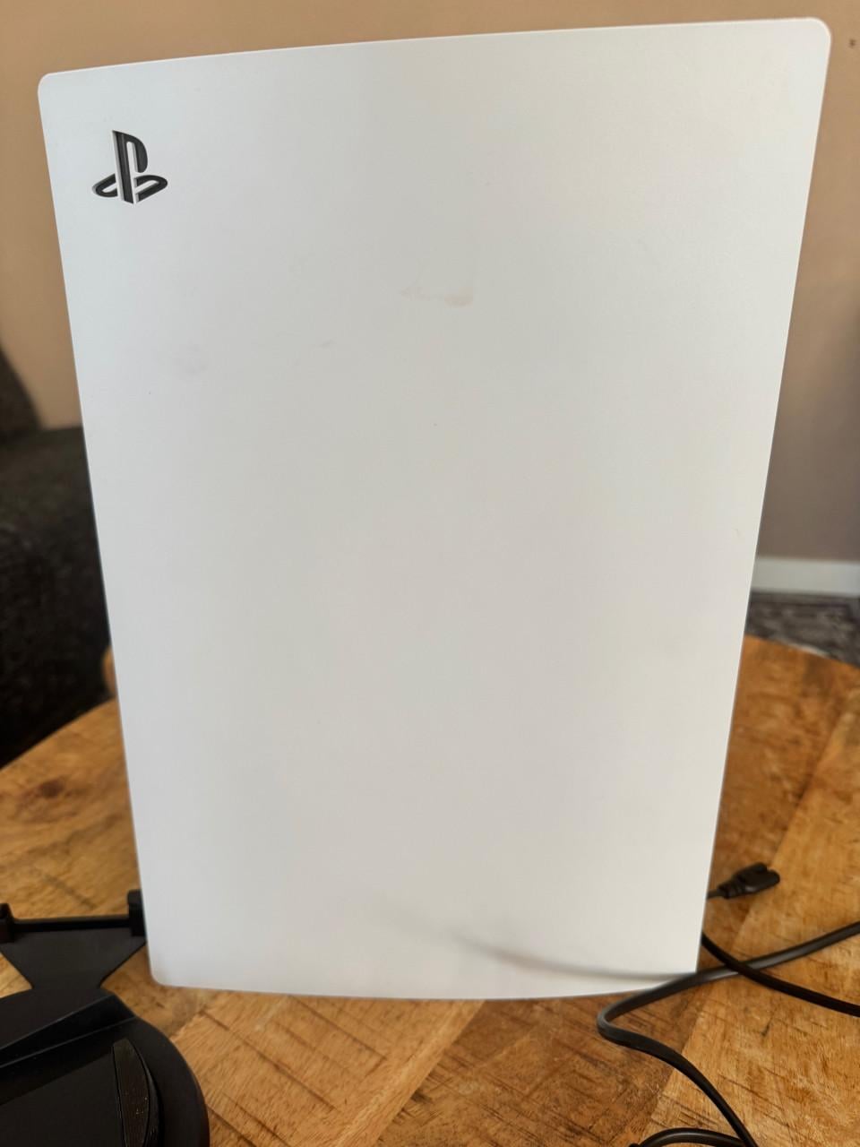 Playstation 5 disc edition met 1 controller en 4 spellen