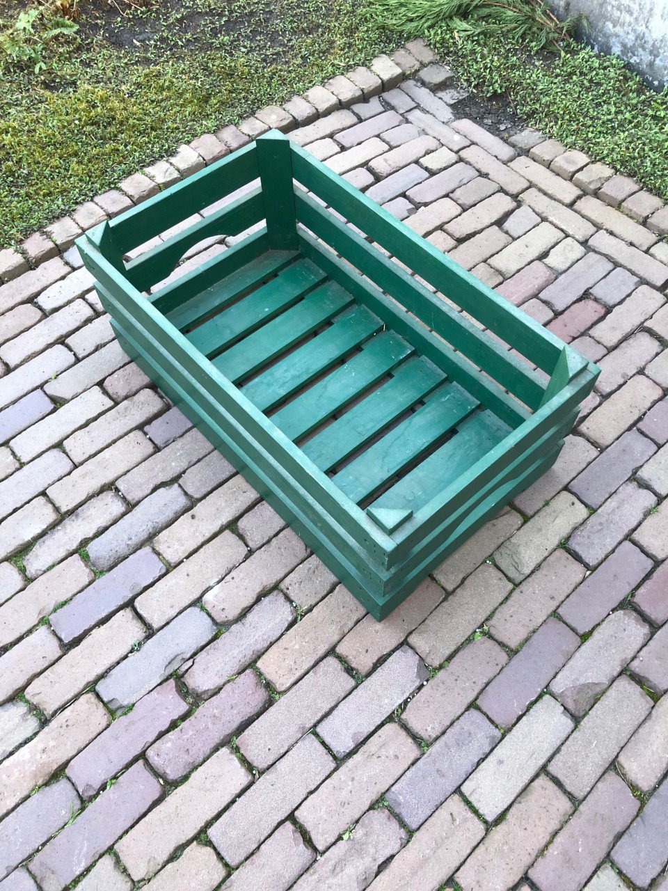 Groene houten krat