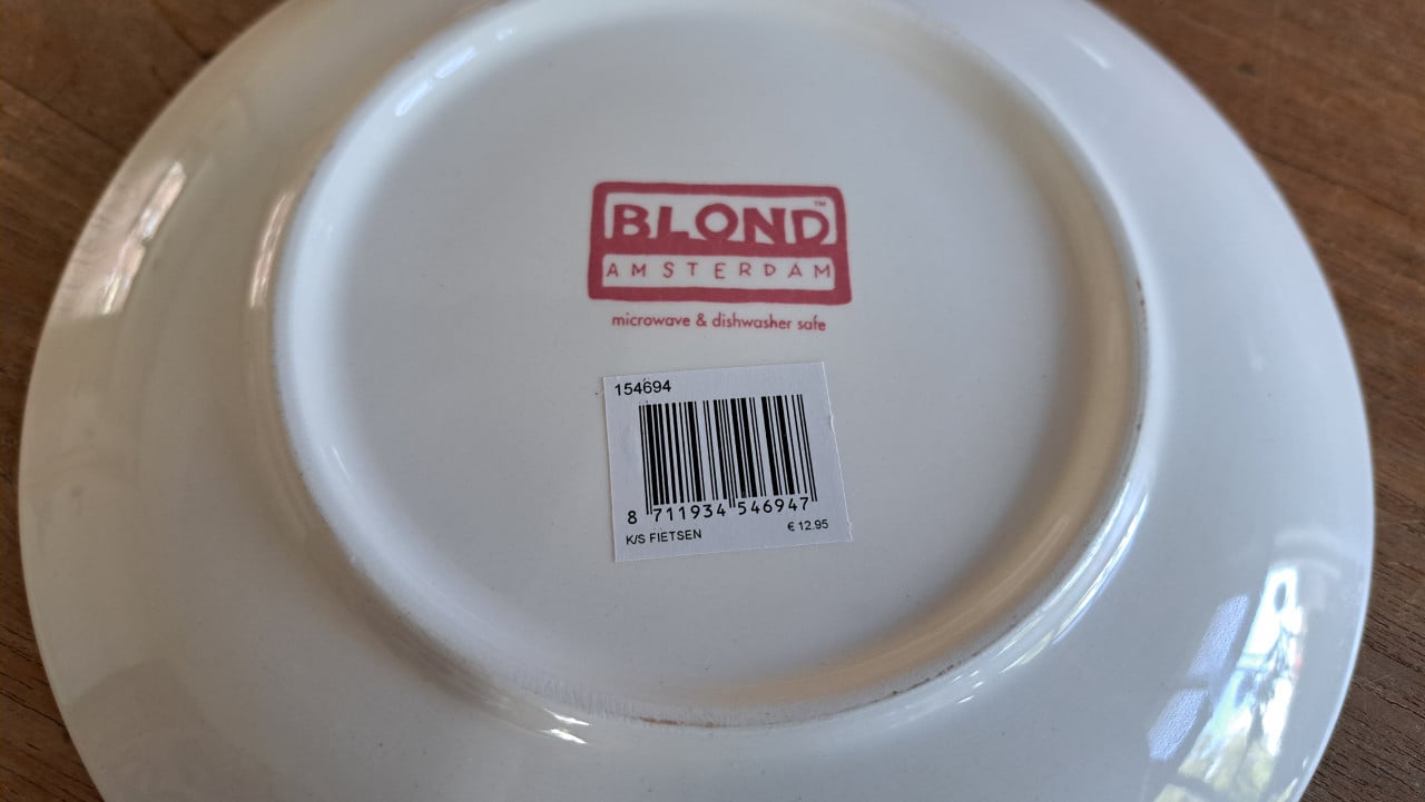 Blond Amsterdam kop en schotel fietsen