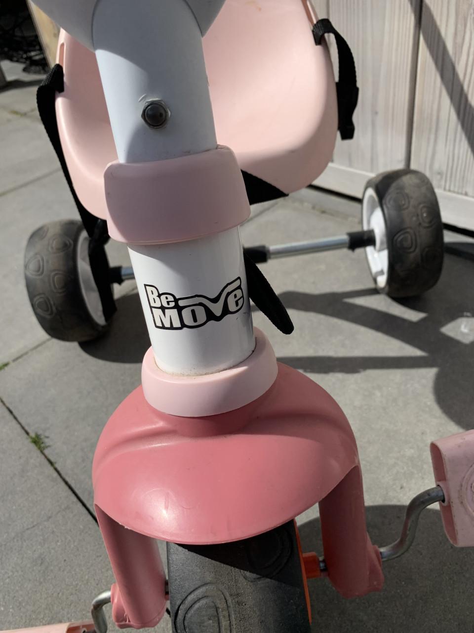 Leuke roze Smoby Be Move driewieler, met duwstang