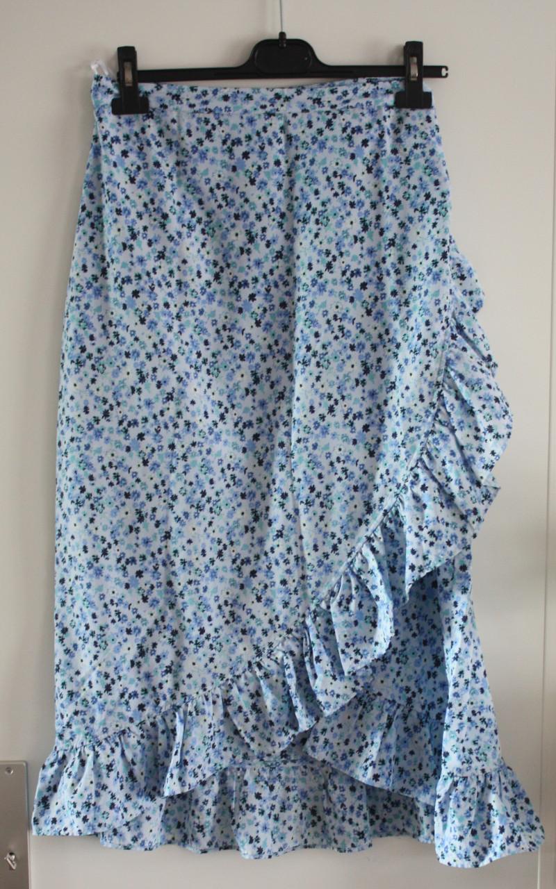 Licht blauwe wikkelrok  met bloemen print maat 46