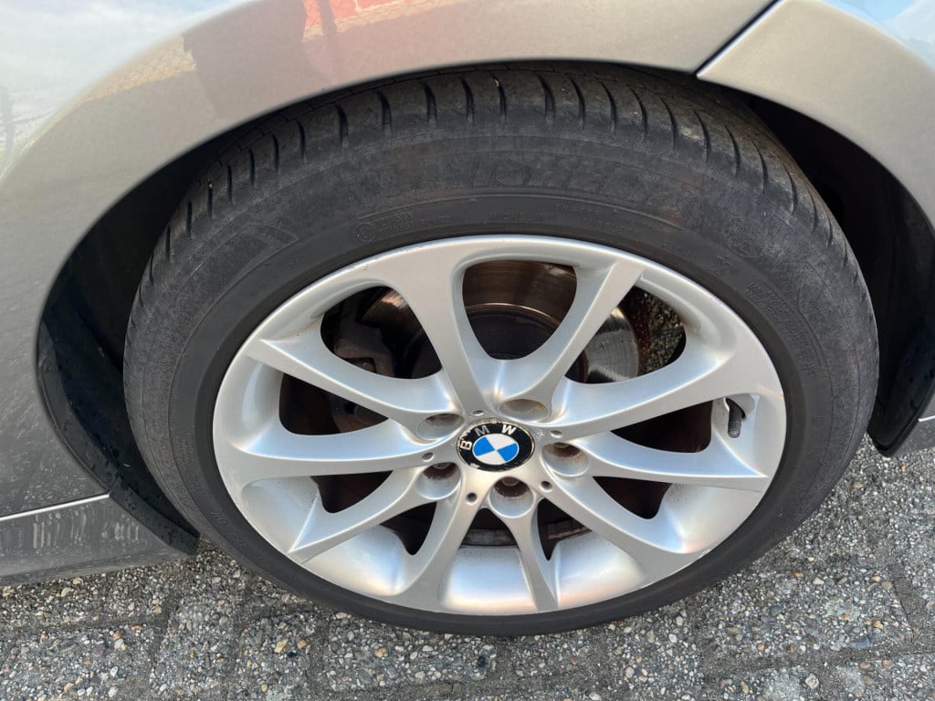 BMW 1 Serie 116i business line ultimate edition | m pakket | leder | trekha