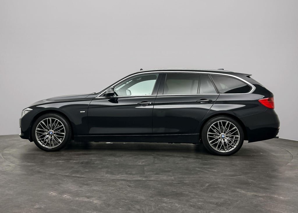 BMW 3-serie touring 320d high executive pano leder automaat