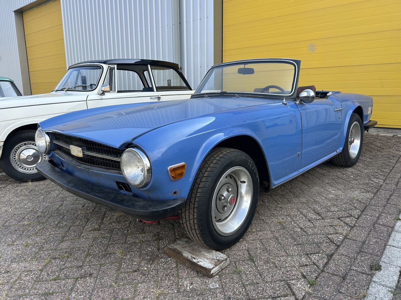 Triumph Herald 1965 en TR6 1973