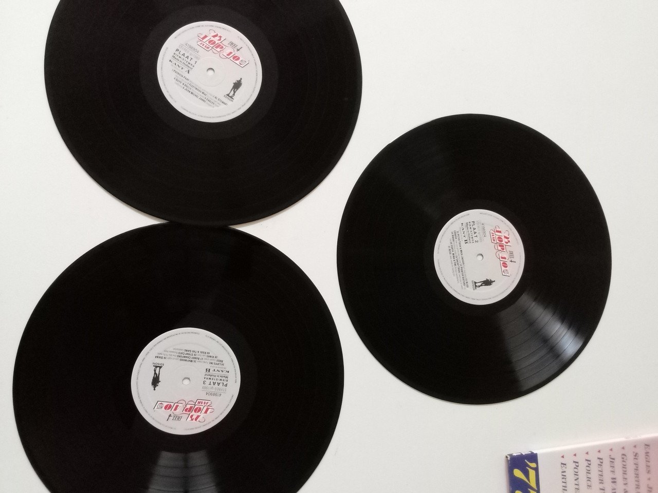 Set van 4 LP's o.a. Grease, Kate Bush, Meatloaf, Diana Ross, The Police
