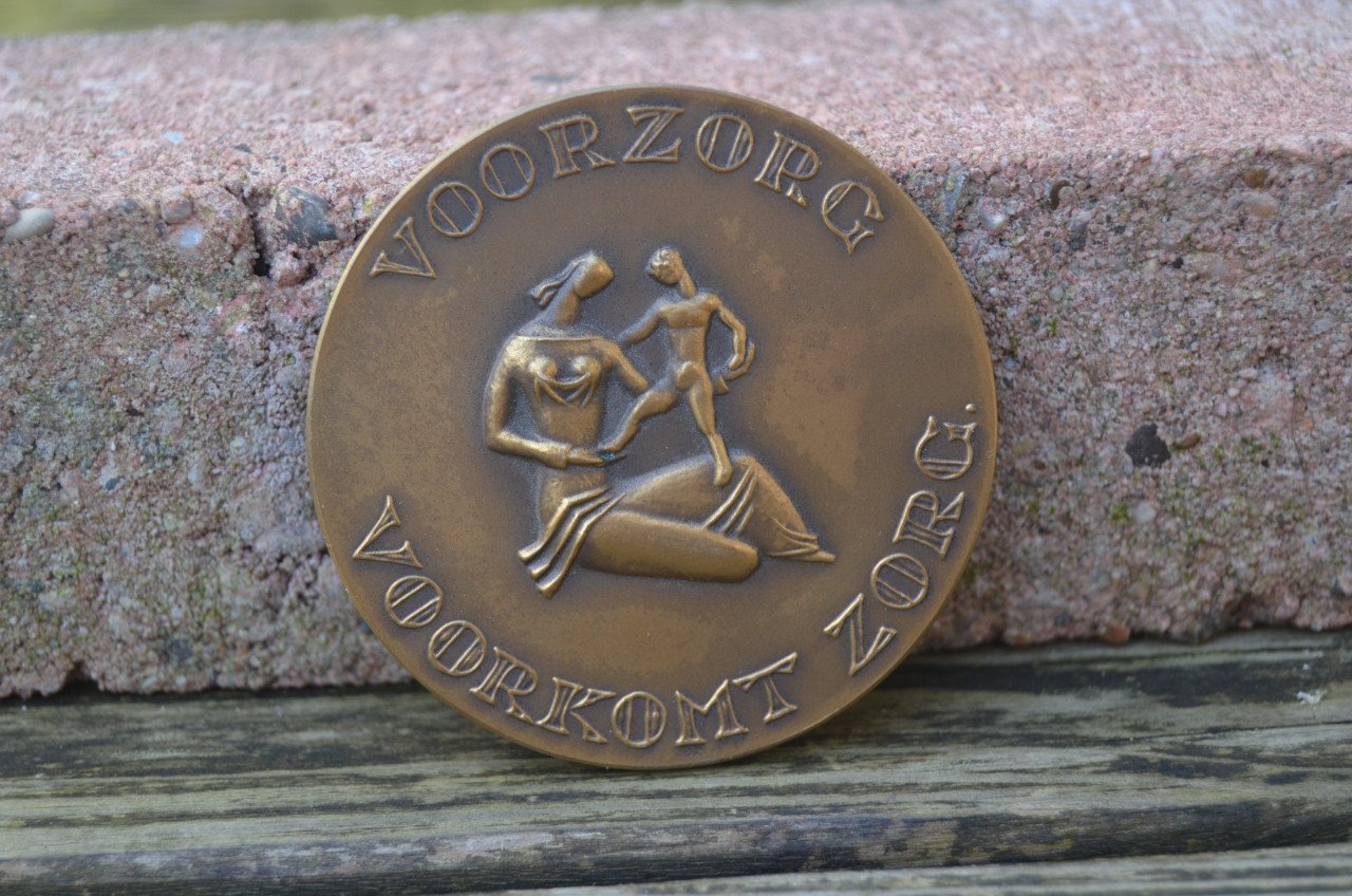 Bronzen penning verzekeringsmaatschappij