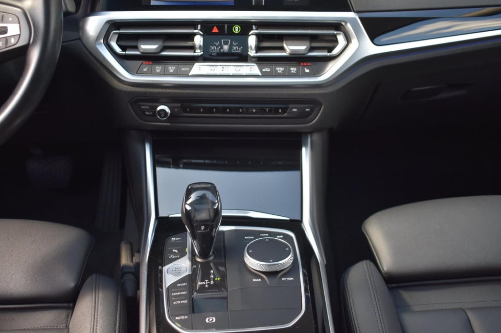 BMW 3-serie 320i high executive | harman kardon | schuif kanteldak | leder 