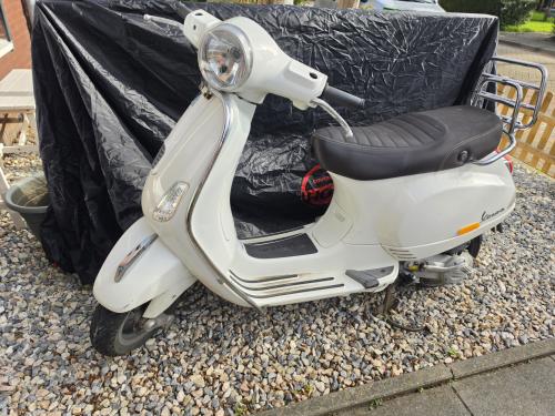Vespa LX50 blauw kenteken