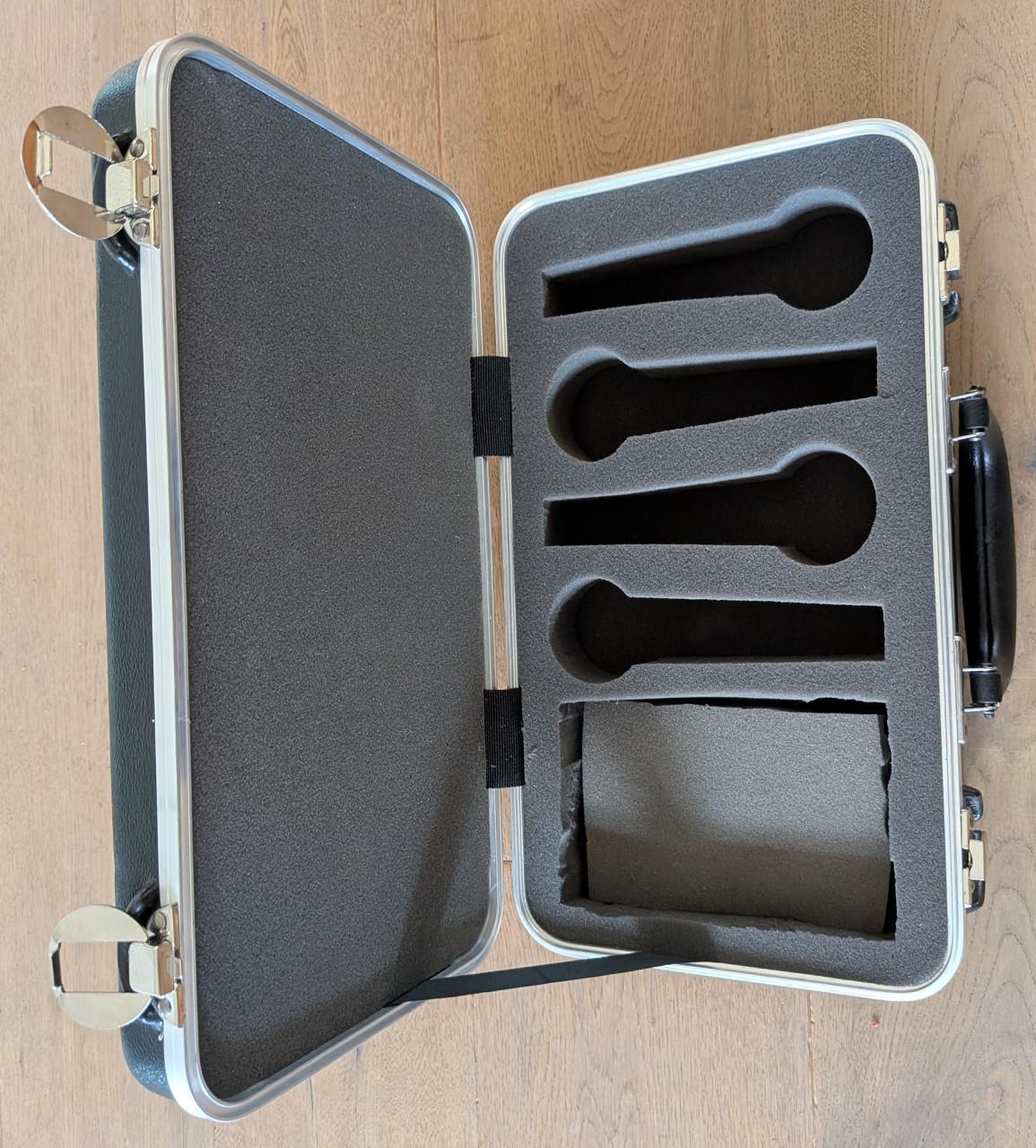 Drie hard case instrument koffers