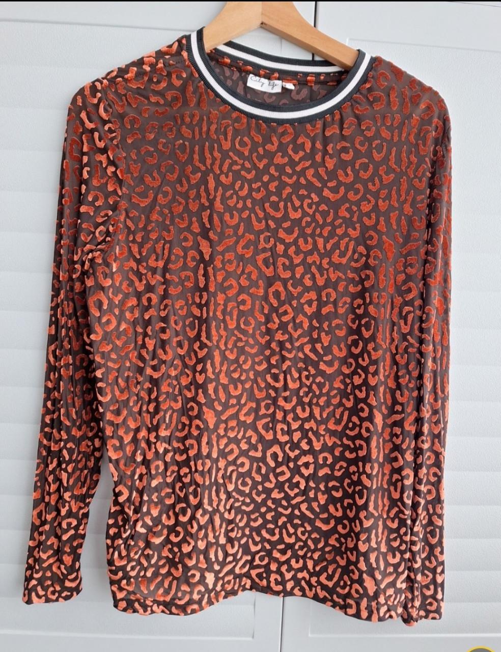 2 panterprint shirts