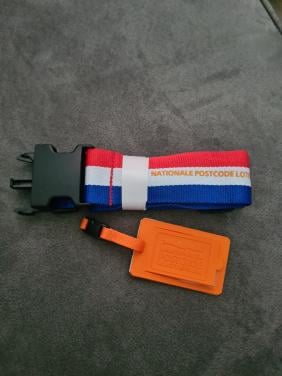 Gratis bagagelabel en riem nieuw!