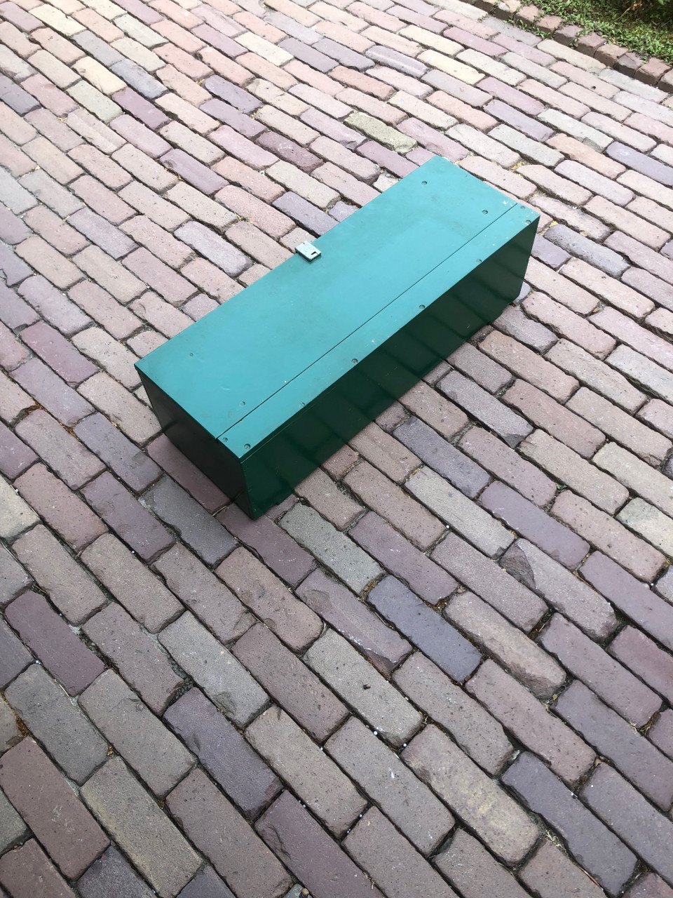 Groene houten kist.