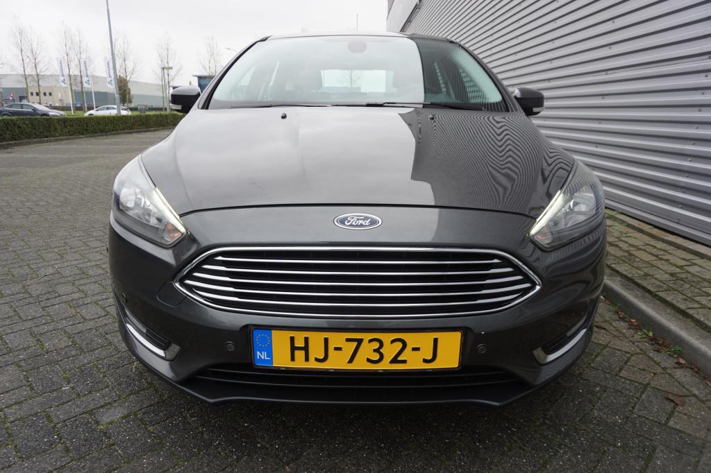 Ford Focus 1.0 titanium edition 1e eigenaar / navi / climate controle / cru