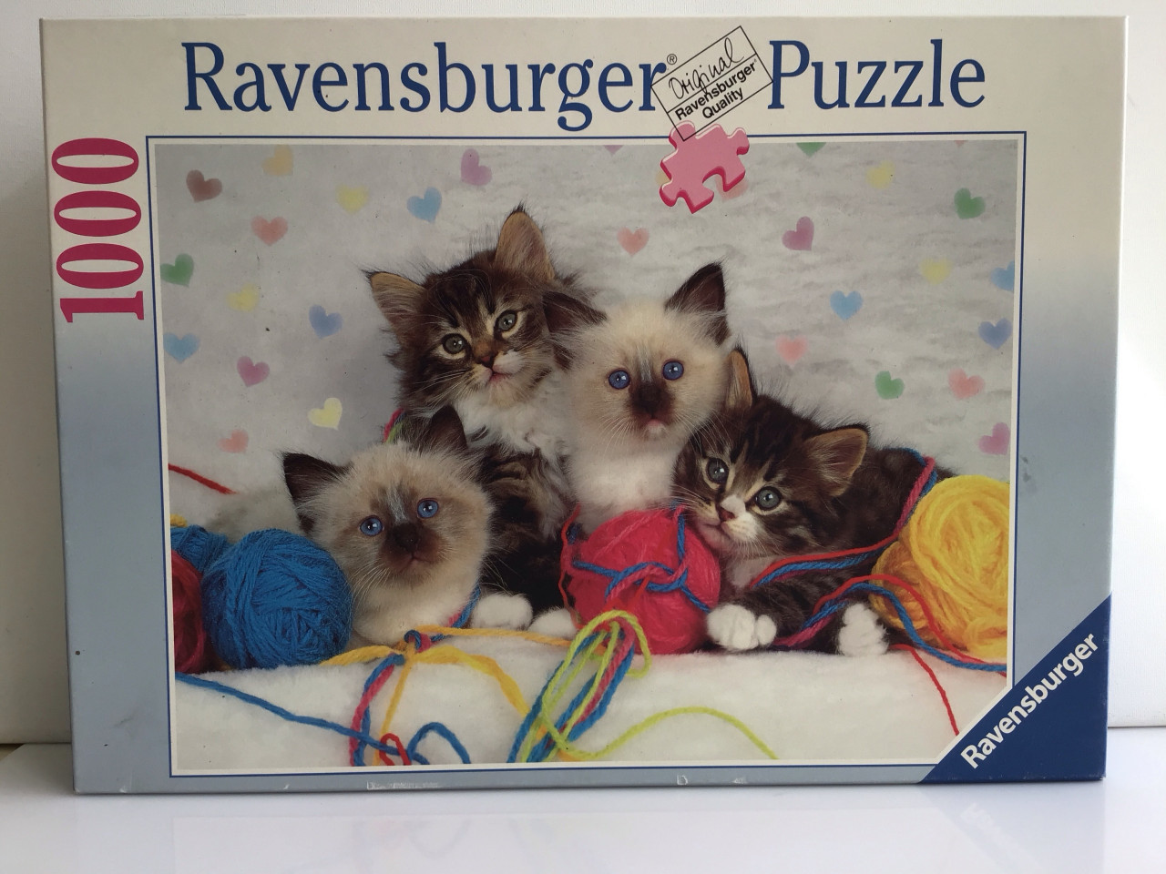 Puzzel 4 kittens met bolletjes wol