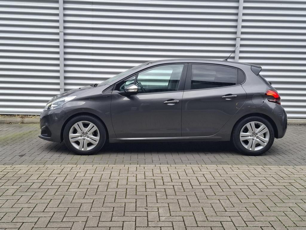 Peugeot 208 1.2 signature nav/airco/cruise/park