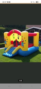 Springkussen clown met glijbaan