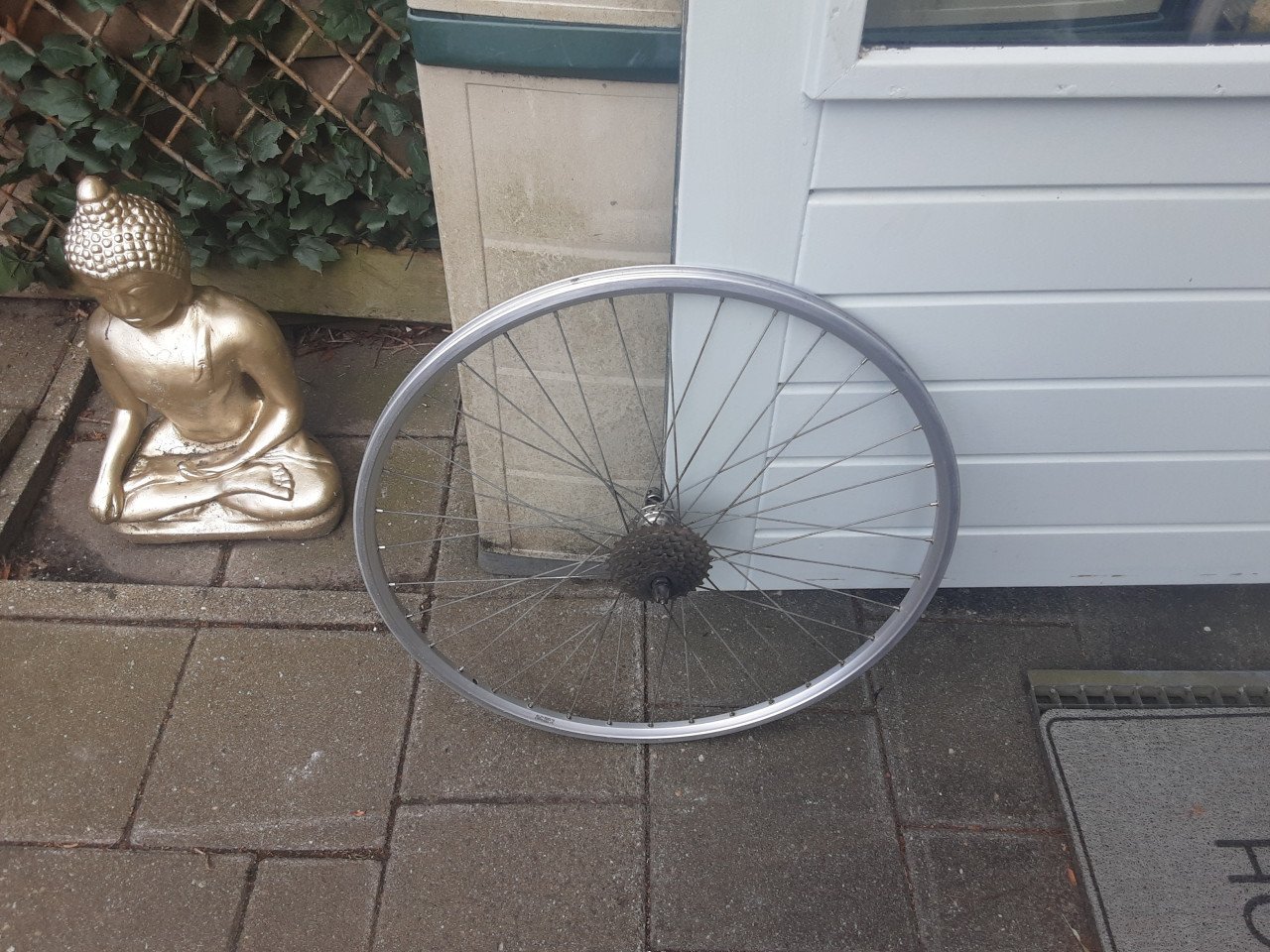 Shimano 28 inch achterwiel, 7 speed cassette, uitvalnaaf
