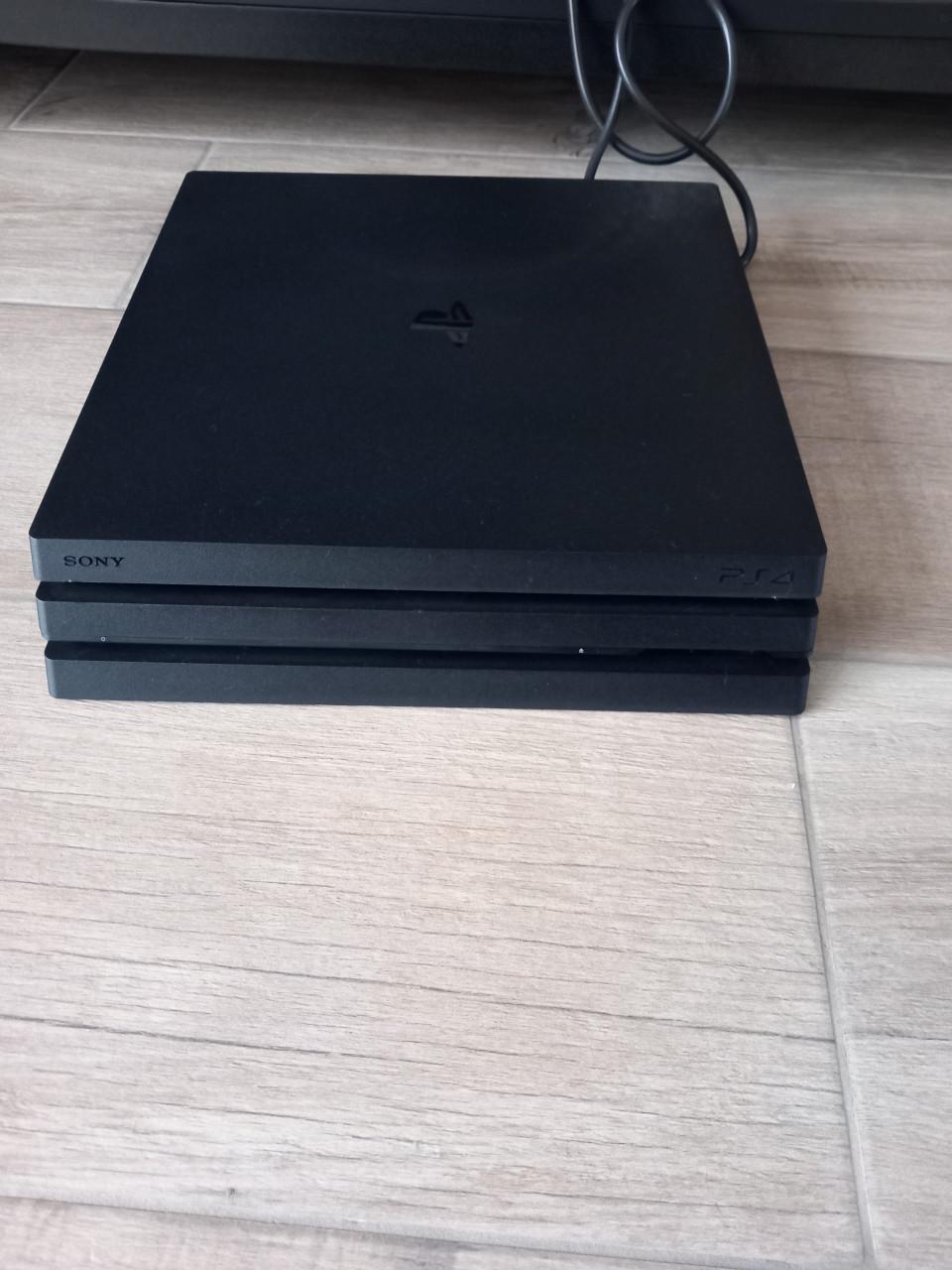 Complete PlayStation 4 Pro + controllers.