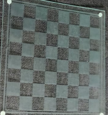 Schaakspel en 2 andere spellen van glas