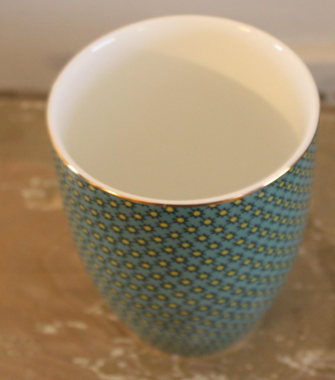 Nieuwe mok groen met gele zonnetjes