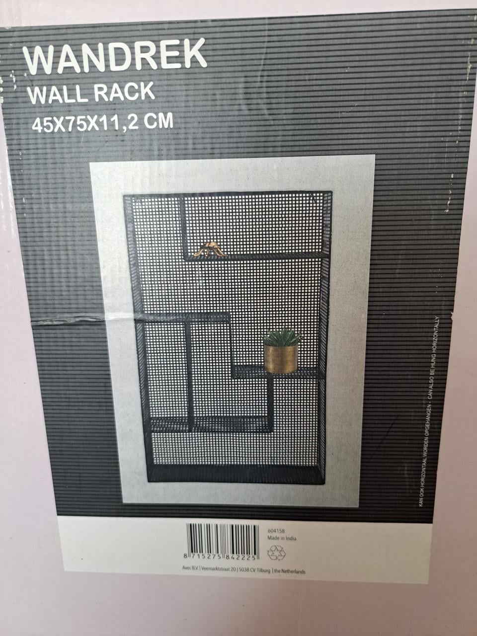 Te koop zwart metaal wandrek nieuw in doos