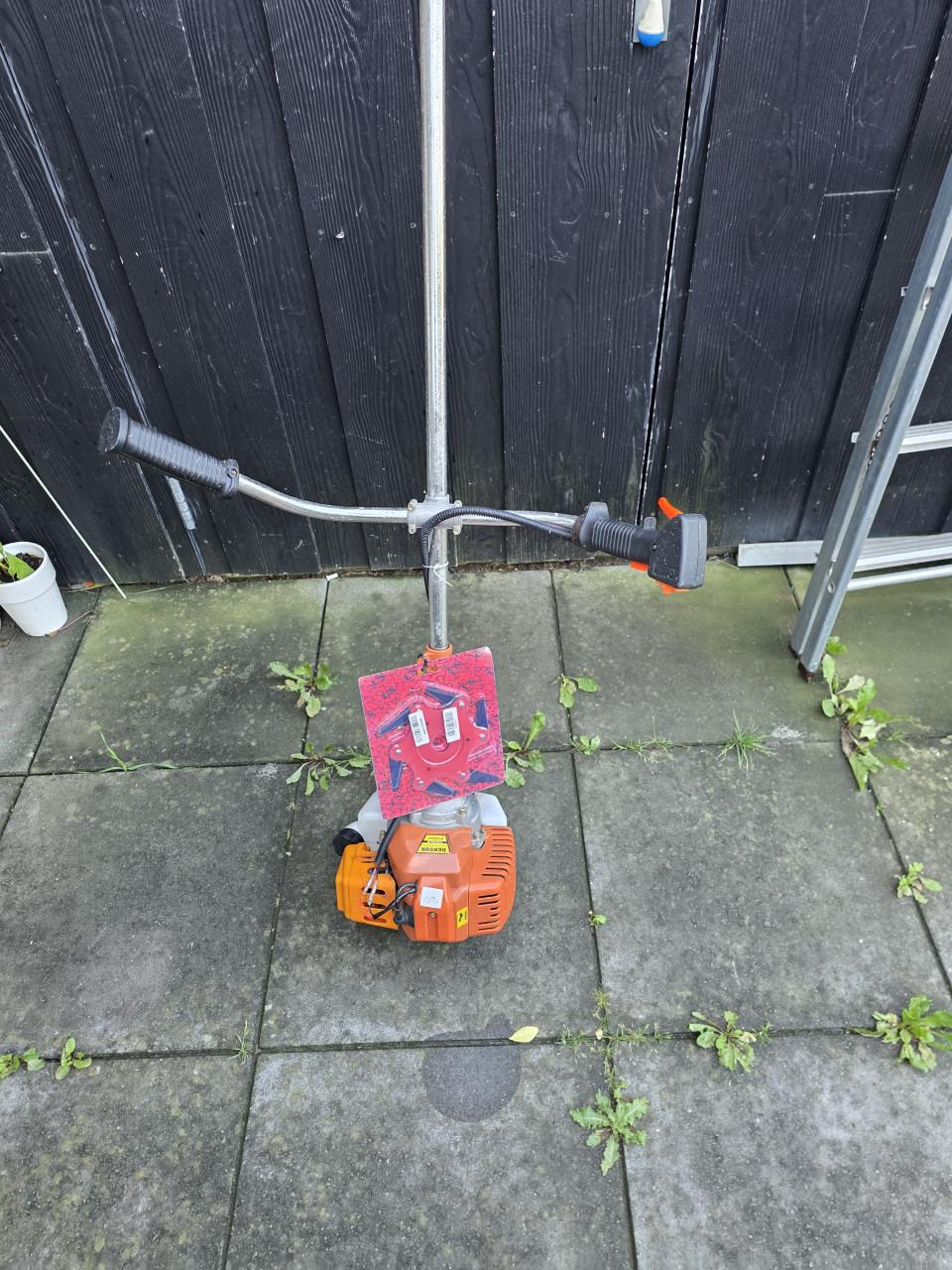 Te koop benzine grasmaaier