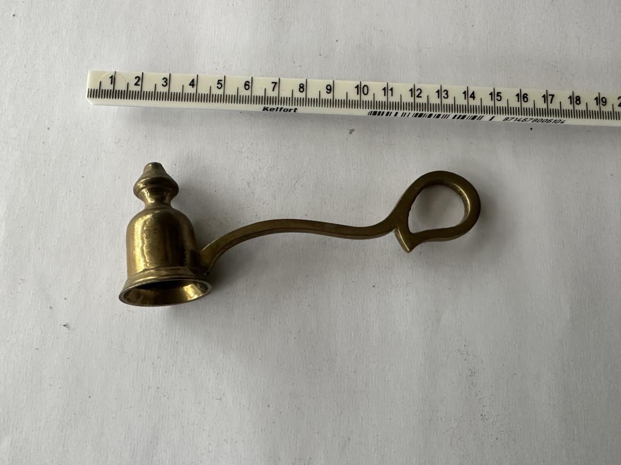 Koperen kaarsendover en brievenopener