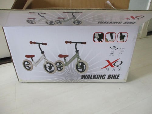 Te koop nieuw in doos 12 " loopfietsje