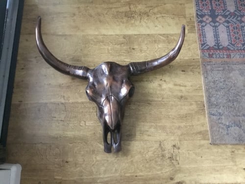 Bronzen buffelkop