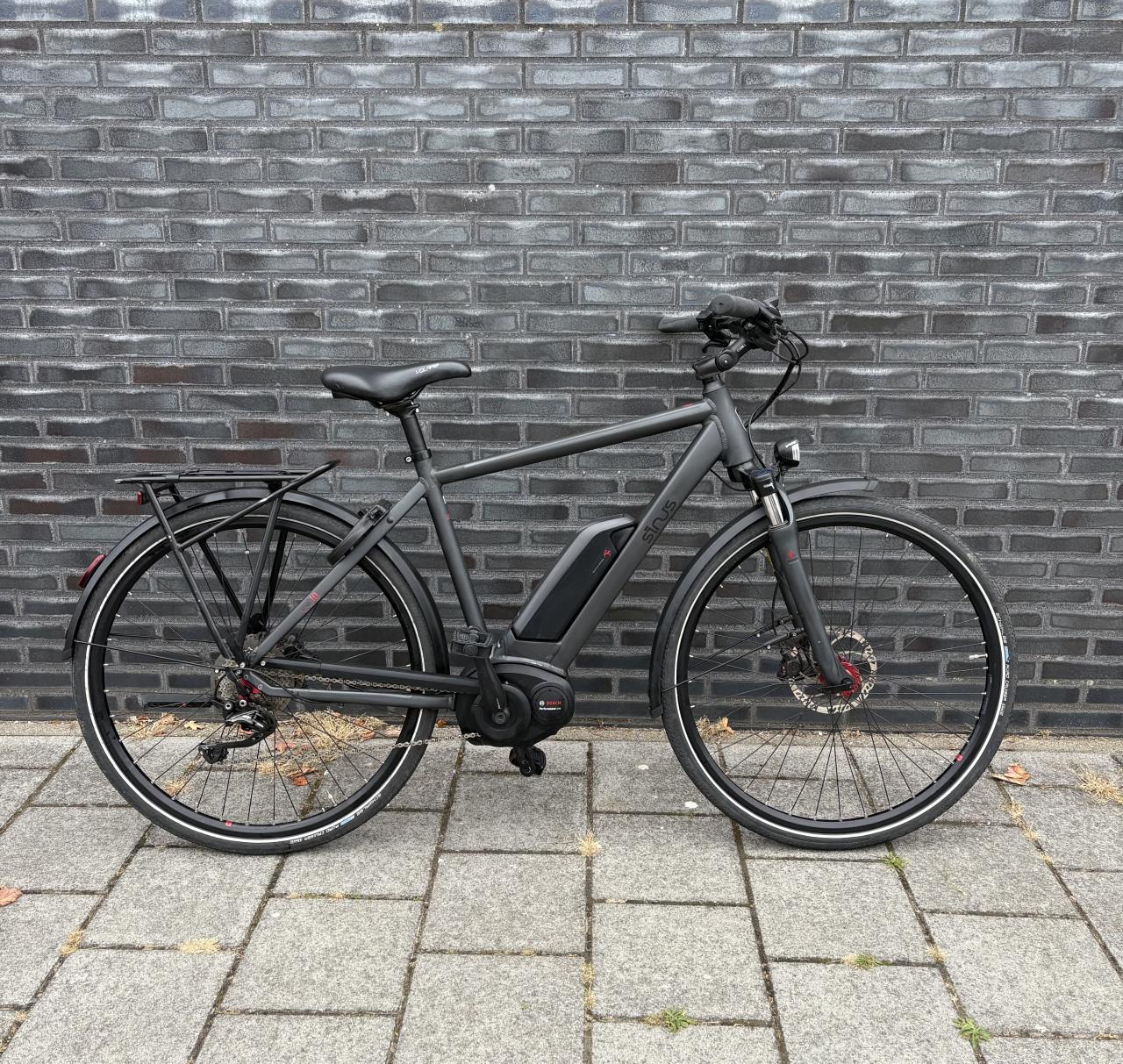 Elektrische herenfiets met sterke motor zo goed als nieuw