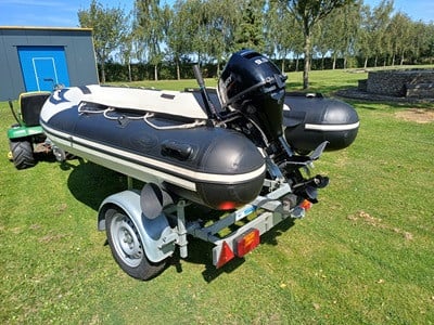 Rib met 9.9 pk en trailer