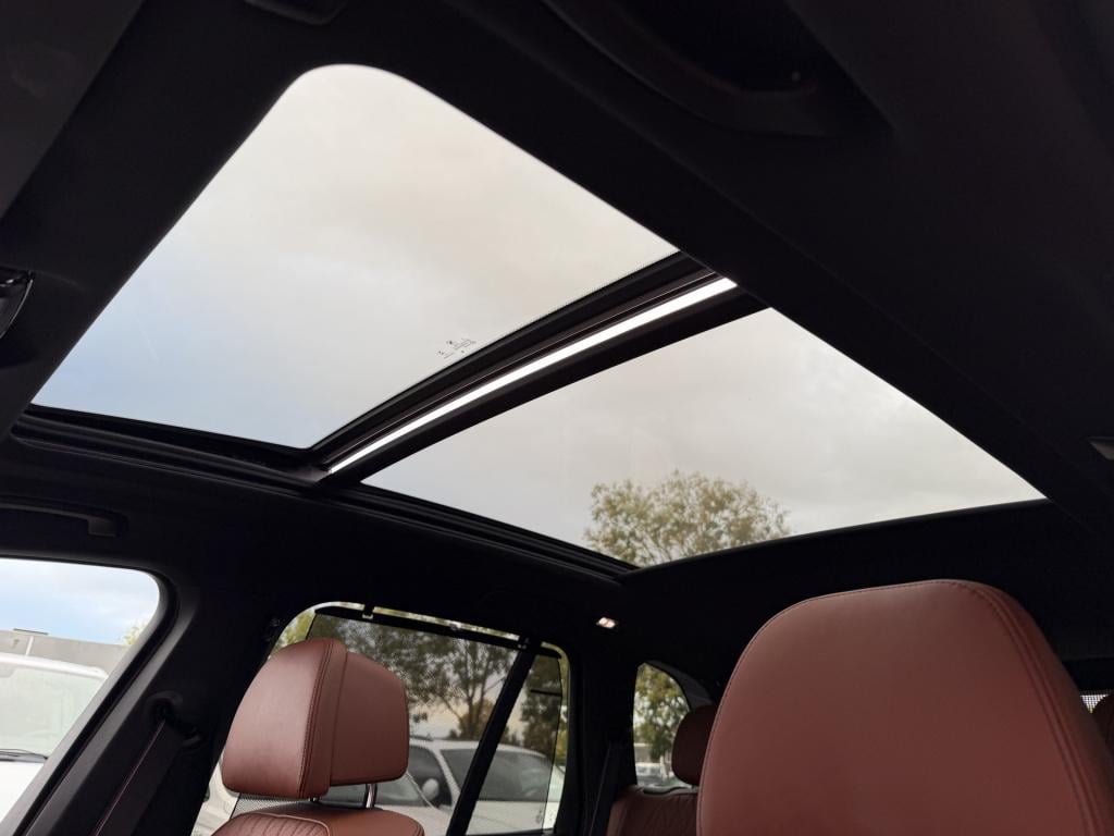 BMW X5 xdrive50e m-sport | pano | luchtvering | elek. trekhaak | rijklaar i