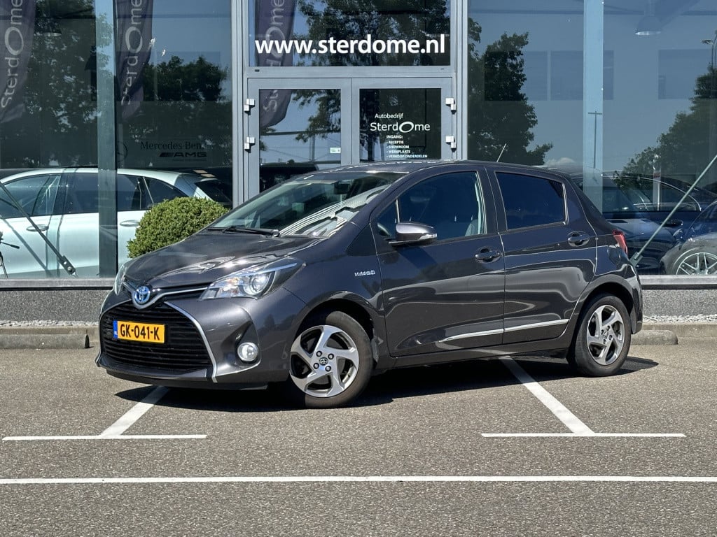 Toyota Yaris 1.5 hybrid lease i camera i automaat i airco l navigatie i zee