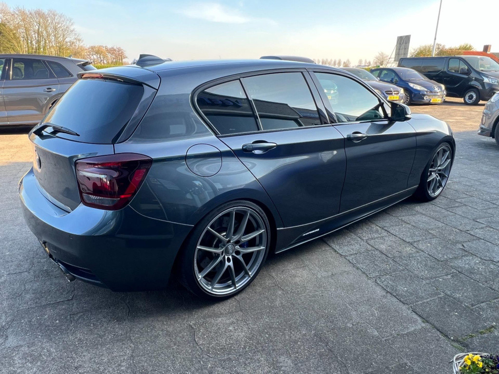 BMW 1 Serie m135i xdrive high executive, customized, stage 2 437 pk!