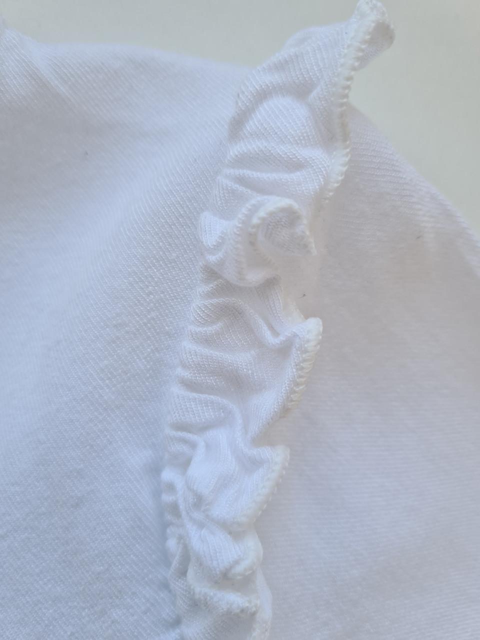 Mooi wit blousje met roezels van H&M Maat 134