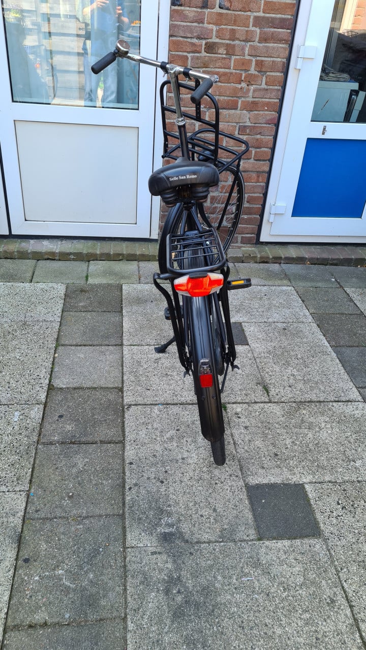 Dames fiets 28inch-met voordrager-traprem achter-